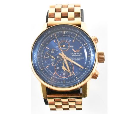 A Vostok Europe limited edition chronograph perpetual calendar wrist watch. The watch having a round blue sunburst face with 