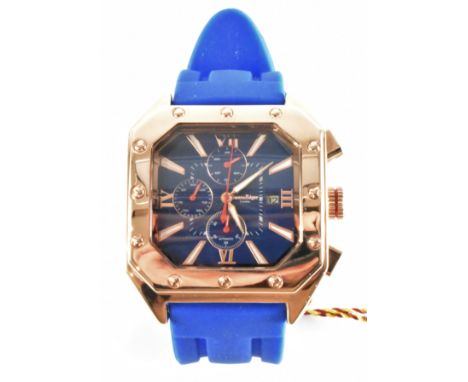 A Swan and Edgar automatic gentleman's wrist watch. The watch having a square face with gilt dial. white baton numerals to th