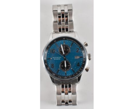 A gentleman's Accurist 7385 stainless steel chronograph watch. The watch having a blue sun burst face with two subsidiary dia