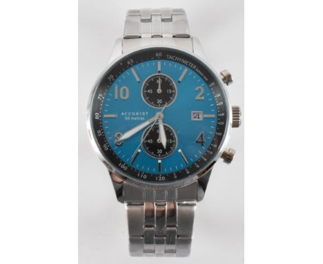 A gentleman's Accurist 7385 stainless steel chronograph watch. The watch having a blue sun burst face with two subsidiary dia