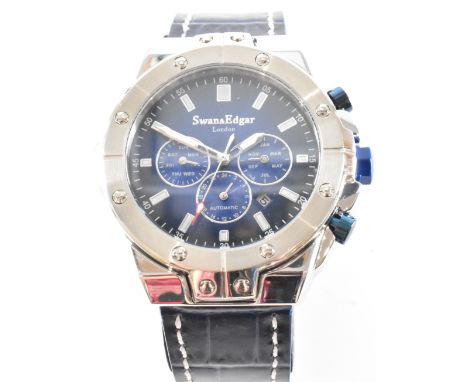 A Swan and Edgar London 9090 automatic chronograph wrist watch. The watch having a round face with a blue sunburst dial, thre