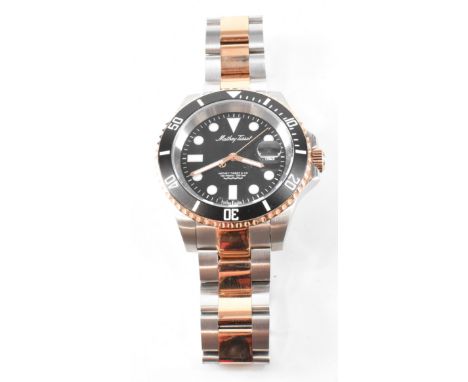A&nbsp;Mathey-Tissot gentleman's wristwatch. The watch having baton and dot numerals to the chapter ring and aperture at thre