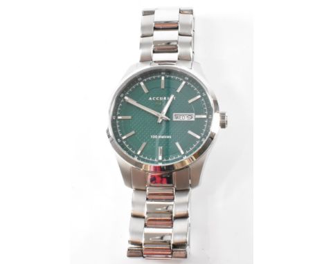 An Accurist gentleman's wrist watch.&nbsp;The watch having baton numerals to the chapter ring and aperture at three.&nbsp;The