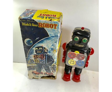 Japan Taiyo Blink-A-Gear Robot in original Box ..box is worn with damage robot in good untested condition. Measures approx 15