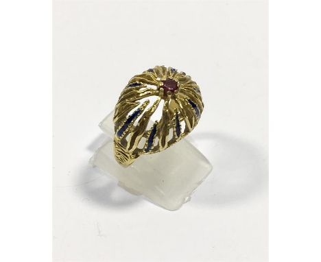 18ct Gold Enamel & Ruby Dress Ring streaks of blue enamel with small central Ruby hallmarked 750 weight 6.3g l 