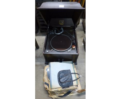 A wooden 'His Master's Voice' record player no.4 and a collection of records 