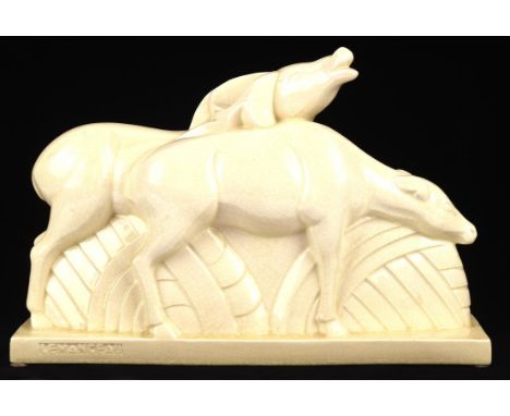 Charles Lemanceau, Stag and doe, white glazed pottery group, impressed signature, 31cm high x 45cm wide x 11cm deepCondition 