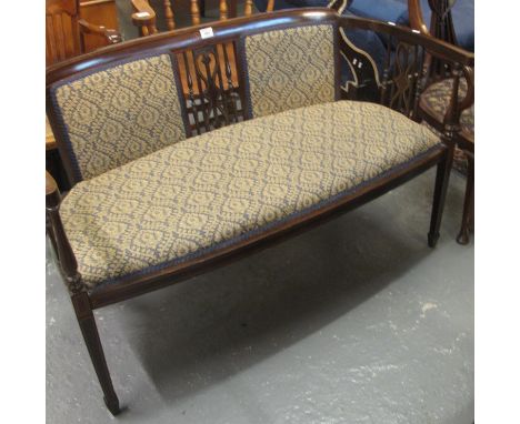 Edwardian mahogany inlaid parlour sofa together with a similar Edwardian mahogany inlaid open arm chair with serpentine front