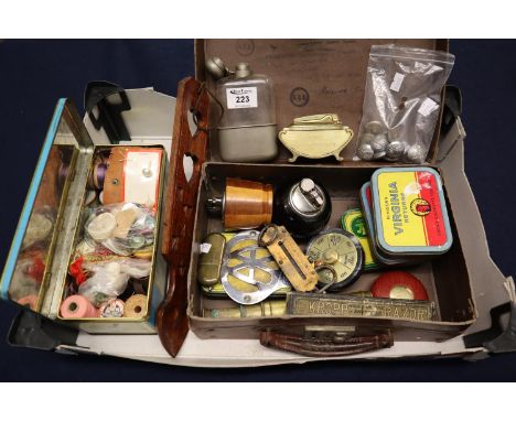 Box of oddments to include; vintage AA badge, various tobacco tins, biscuit tins, cigarette lighters, glass flask, small bras