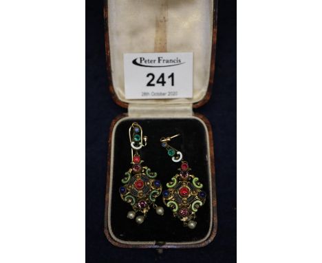 A pair of gold plated brass earrings set with pastes and decorated with enamel. (B.P. 21% + VAT) Used condition with wear. No