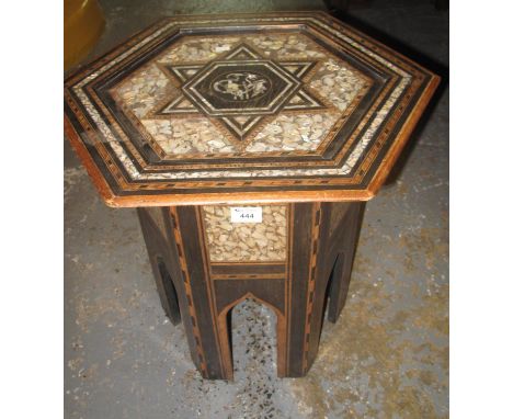 Middle eastern design mother of pearl inlaid hexagonal lamp table. (B.P. 21% + VAT) Some inlay is missing to the top of table