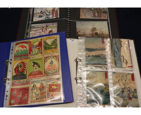 Ring binder album of Japanese postcards, topographical, military, First World War etc. Together with an album of match box/sa