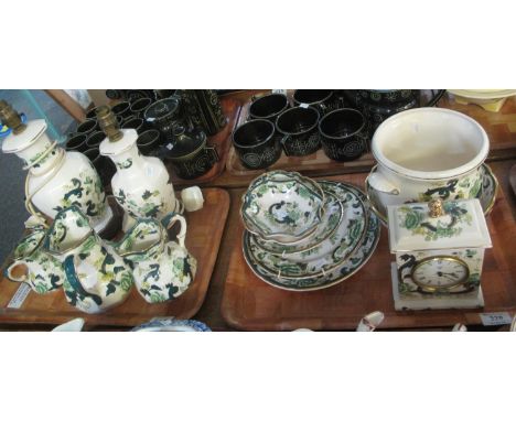 Two trays of Mason's Ironstone Chartreuse design items to include; a set of four graduated pouch shape dresser jugs, two tabl