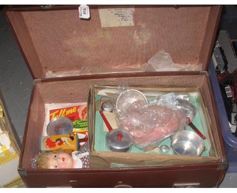 Vintage Pioneer luggage suitcase, the interior comprising a smaller suitcase, child's doll, vintage games including; 'Tell Me