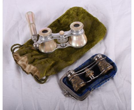 A pair of mother-of-pearl cased opera glasses by Dolland of London and a pair of Damascene opera glasses