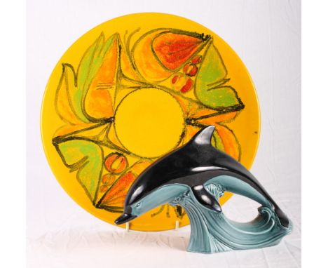 A Poole Pottery "Delphis" charger, 14" dia, and a Poole dolphin