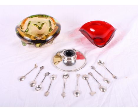 A silver capstan inkwell (no cover), a set of nine decorative spoons and two coloured glass bowls