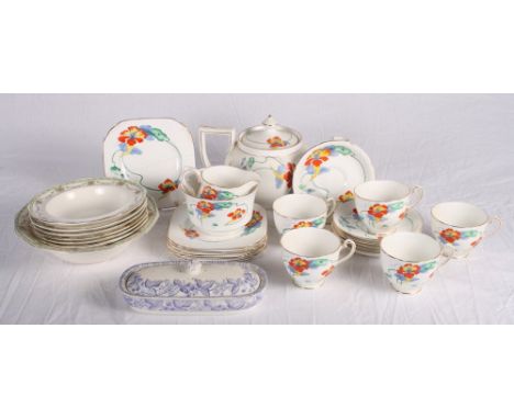 A 1930s floral decorated bone china part tea service, a Myott dessert service and a Davenport toothbrush holder