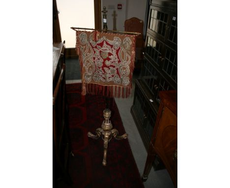 A Victorian beadwork panel adjustable firescreen, on gilt tripod base