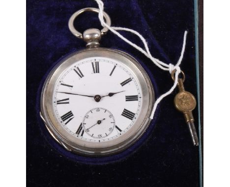 A silver cased open faced key wind pocket watch with white enamel dial and subsidiary seconds dial, in fitted leather case