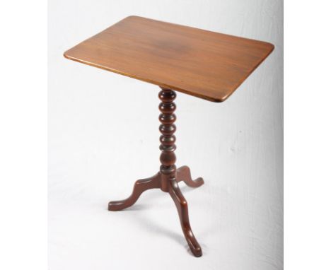 A 19th Century rectangular tilt top occasional table, on bobbin turned stem and tripod base, 22" x 16"