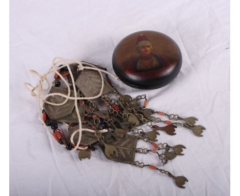 A Russian pre-revolutionary lacquered box with portrait of a woman in traditional costume, 3 1/2" dia, and a metal panel and 