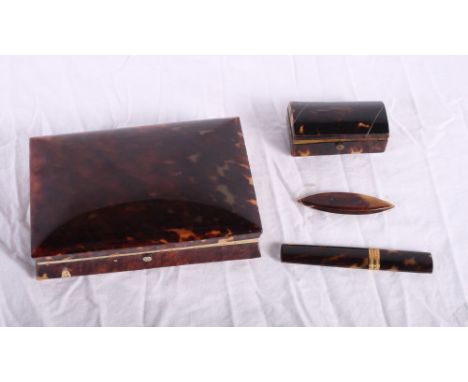 A 19th Century tortoiseshell box, a smaller dome top trinket box, a bodkin case and a cotton winder