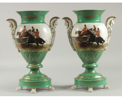 A PAIR OF SEVRES DESIGN TWO HANDLED URNS decorated with hunting scenes. 16ins high.