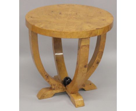 A LIGHT WOOD ART DECO DESIGN CIRCULAR TABLE. 22ins diameter.