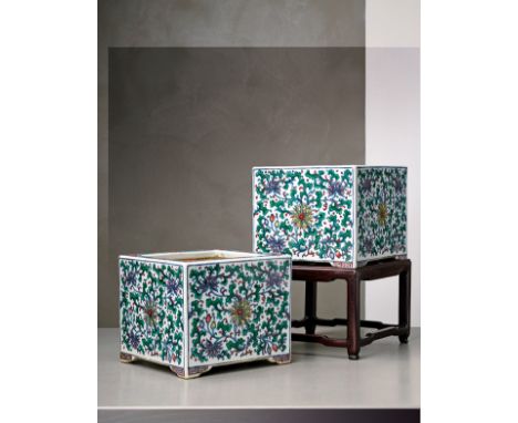 An important and rare pair of doucai square porcelain jardinieres on stands dating: Qing (1644-1911) provenance: China Raised