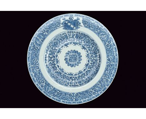 An important and large armorial plate in blu and white porcelain of the Portuguese Indian Companies dating: Kangxi (1662-1722