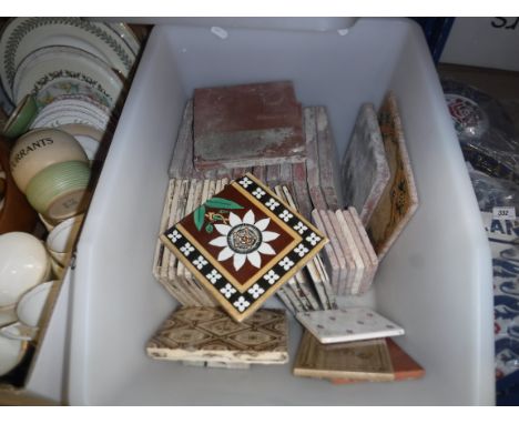 A collection of Victorian and later floral decorated tiles, some bearing Victorian registration marks, together with a collec