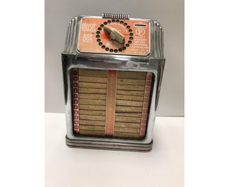 A Buckley music system music box, 28.5 cm, together with an early 20th Century oak cased polyphon of 'Radio' form, the back o