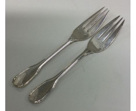 EMILE PUIFOCAT: A rare pair of silver forks. Approx. 56 grams. Est. £50 - £80.