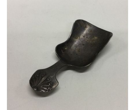 A heavy silver caddy spoon with shell decorated handle. Birmingham. By Levi and Salaman. Approx. 13 grams. Est. £30 - £50.