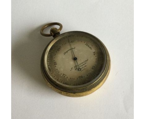 A gilt metal barometer with silvered dial. Est. £30 - £40.