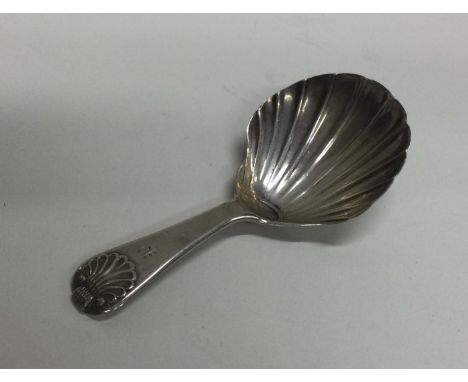 A George III silver caddy spoon. London 1814. Approx. 10 grams. Est. £30 - £50.