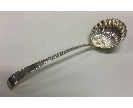 An18th Century silver sauce ladle with feather edge decoration. London circa 1770. By William Turton. Approx. 43 grams. Est. 
