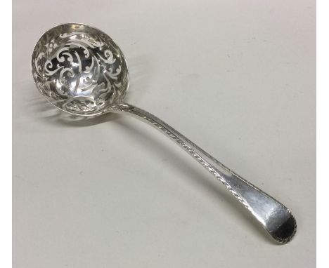 An 18th Century feather edged silver sauce ladle. London 1762. By John Lambe. Approx. 38 grams. Est. £80 - £120.