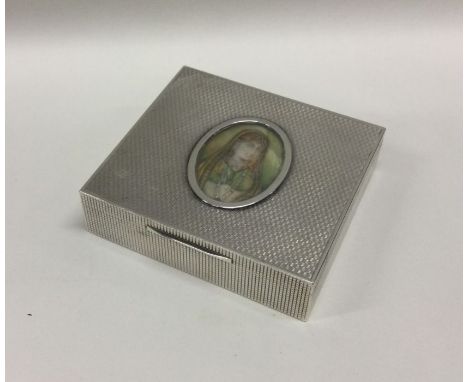 A square silver cigarette box with engine turned decoration and oval central picture. Approx. 199 grams. Est. £120 - £150.