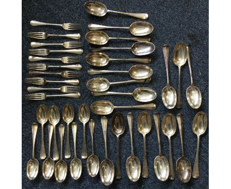 An extensive OE and rat tail pattern matched cutlery set with crested terminals, comprising: 19 x tablespoons; 16 x table for