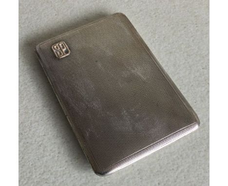 A heavy engine turned silver cigarette case. London. Approx. 145 grams. Est. £50 - £60.
