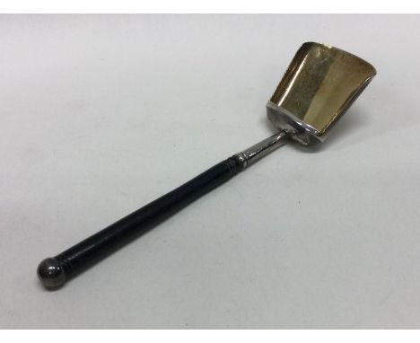 A large George III silver caddy spoon with whalebone handle. Birmingham 1819. By John Taylor. Approx. 22 grams. Est. £60 - £8