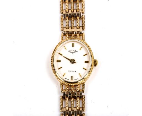 ROTARY - a lady's 9ct gold quartz bracelet watch, white dial with gilt baton hour markers and 9ct bracelet, 7 jewel movement,