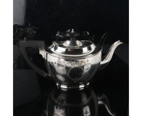 A George V silver teapot, oval form with engraved Adam's style swag decoration and ebonised mounts, by Barker Brothers, hallm