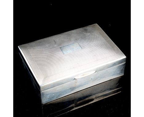 An Elizabeth II silver cigarette box, rectangular form with engine turned decoration, by Charles S Green & Co Ltd, hallmarks 