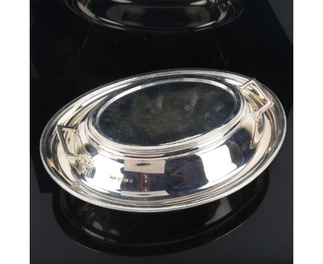 An Elizabeth II silver entree dish and cover, oval form with two handles, by Roberts & Belk, hallmarks Sheffield 1958, length