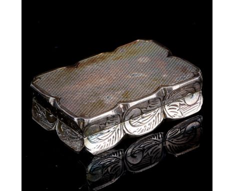 An Elizabeth II rectangular silver pillbox, modelled as a vinaigrette, with engine turned and engraved foliate decoration wit