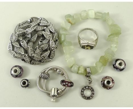 A jade bracelet formed of irregular stones, by Charmology, a silver 925 necklace, each link pave set with paste stone, a whit