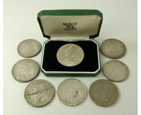 A collection of coins comprising two Victorian silver 1887 crowns, two Victorian silver 1887 double florins, a silver Nationa